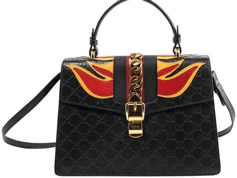 gucci sylvie flame bag|Gucci Sylvie Flame Shoulder Bag In Red Signature .